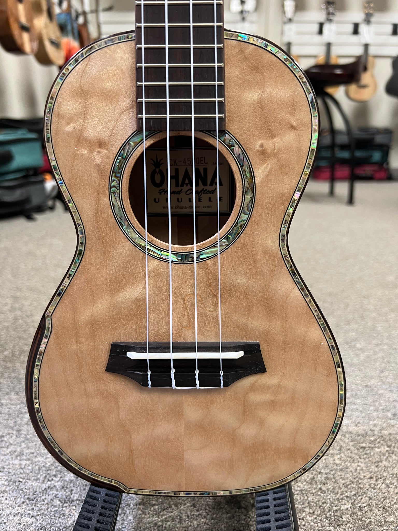 OHANA CK-450QEL Solid Quilted Eucalyptus Concert Ukulele - Bevel Armrest