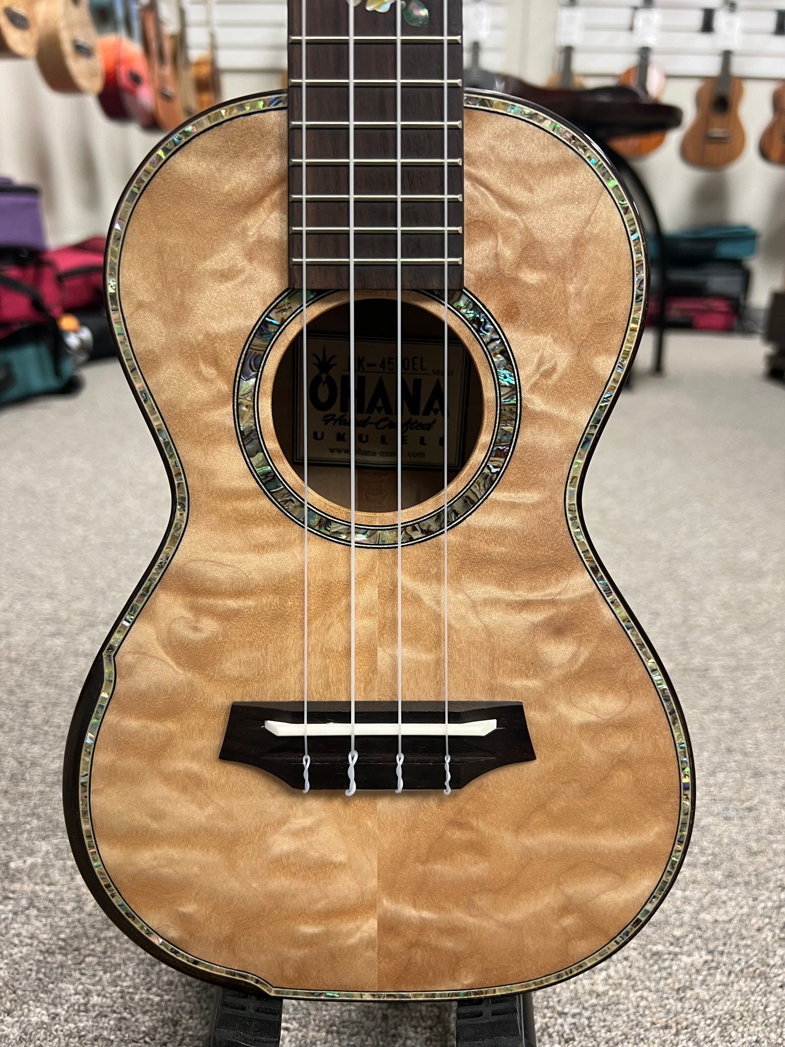 OHANA CK-450QEL Solid Quilted Eucalyptus Concert Ukulele - Bevel Armrest